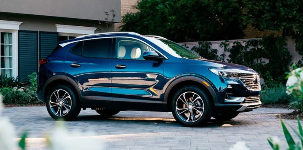 A blue 2022 Buick Encore GX parked on a driveway.