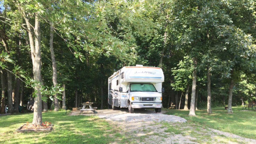 A photo of an RV parked at the Sun Valley Campground in Ohio.
