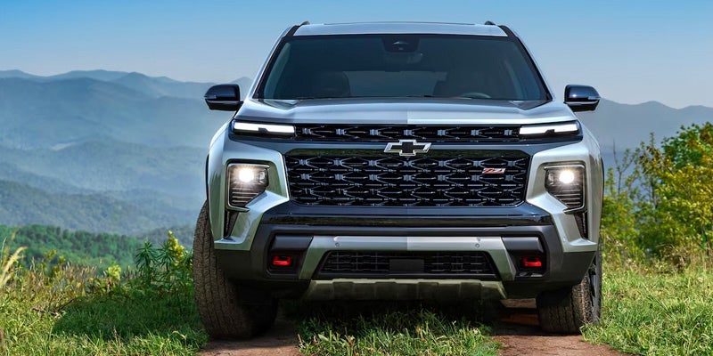 A gray 2024 Chevy Traverse facing us head on.