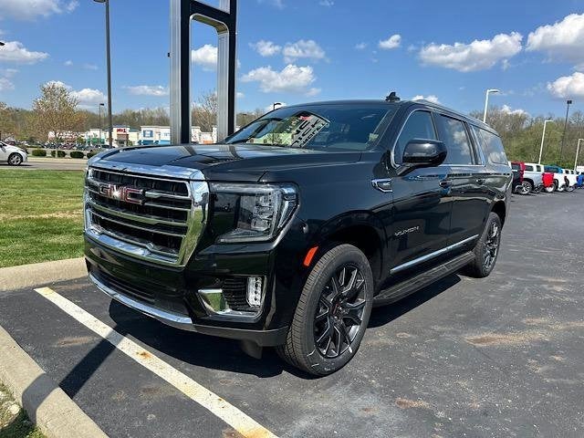 A black 2024 GMC Yukon XL.
